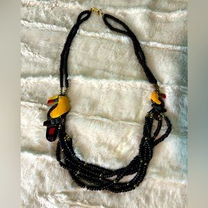 Vintage wooden beads and handpainted bird necklace ..hook clasp